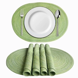 Set di 4 tovagliette ovali verdi in cotone intrecciato per decorazione tavola termica