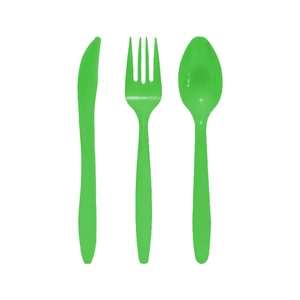 Close-up of disposable green plastic cutlery set for soccer themed birthday party decor