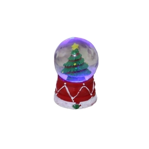 Glowing Christmas tree crystal ball decoration with red base and purple LED lighting
