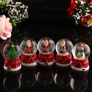 Set of 5 Christmas snow globes with Santa and snowman on festive red bases