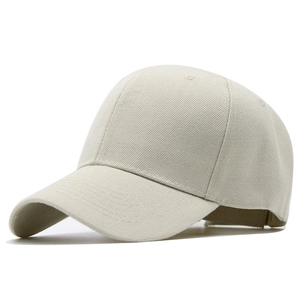 Detail of light beige twill cotton baseball cap with six-panel construction and eyelets