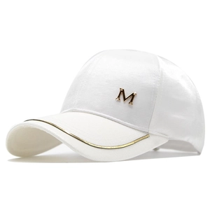Detailed view of white satin baseball cap with gold metallic M logo and brim trim