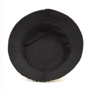 Double-sided cotton bucket hat with colorful print and solid black inner lining