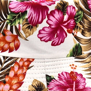 Reversible cotton sun hat for women featuring vibrant pink hibiscus and tropical leaf prints