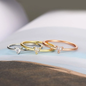 Minimalist heart zircon rings in silver, gold, and rose gold finishes for women