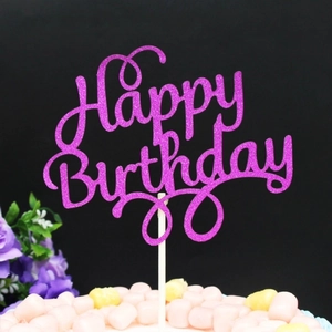 Glittering purple Happy Birthday cake topper on marshmallow cake with floral accents