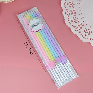 Close-up of 10-piece colorful 11.3cm slender candles in gift pack with pink bow