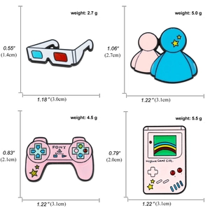 Set of pink and blue enamel pins featuring cute game controller and 3D glasses
