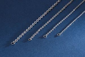 Macro view of stainless steel O-chains in four different widths for jewelry DIY