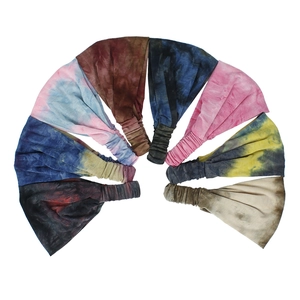 Detail of high-stretch tie-dye yoga headbands in eight vibrant color patterns