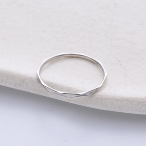 Minimalist geometric faceted titanium steel ring with a polished silver finish for punk style