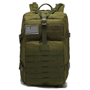 Close-up of military green tactical backpack with Molle system and flag patch