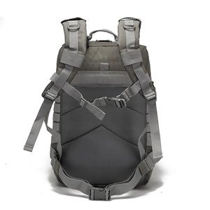 Ergonomic breathable mesh back padding and adjustable tactical straps on a grey backpack