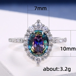 Exquisite four-prong ring with a 7x10mm multi-color oval zircon and silver band