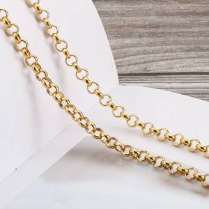 Minimalist gold body chain with pearl accents and adjustable polished links
