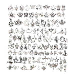 Detailed grid layout of various silver alloy charms including animal and celestial shapes