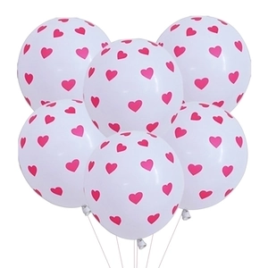 White latex balloons with pink heart prints for wedding and Valentine decor