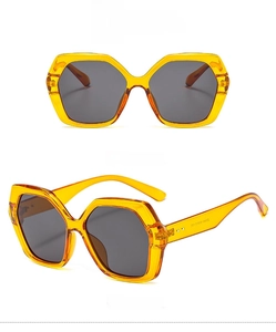 Front and 45-degree angle view of oversized orange geometric sunglasses with grey lenses