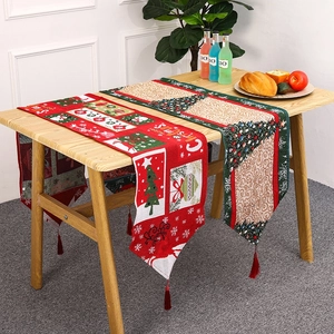 Christmas table runner with snowman and deer patterns for festive dining room decor