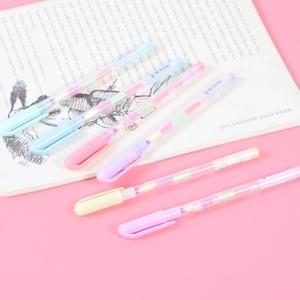 Set of 6 rainbow gel pens in macaron colors on a pink background for drawing