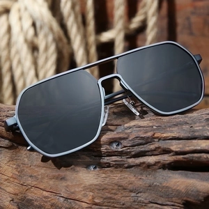 Men's aviator sunglasses with gunmetal frame and double bridge on natural wood background
