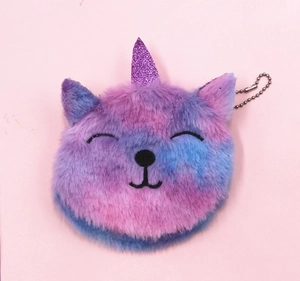 Detail of plush unicat coin purse with tie-dye fabric and sparkly pink sequin unicorn horn