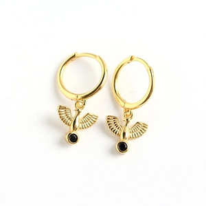 S925 silver phoenix hoop earrings in gold finish with round black gemstones on white base