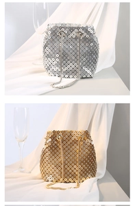 Close-up of sparkling gold and silver rhinestone bucket bags with elegant chain straps