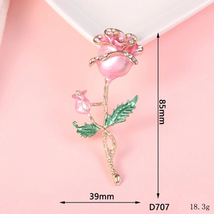 Macro view of pink rose alloy charm with rhinestones and detailed size dimensions