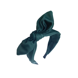 Solid dark green satin headband featuring a large elegant bow for women's hair styling