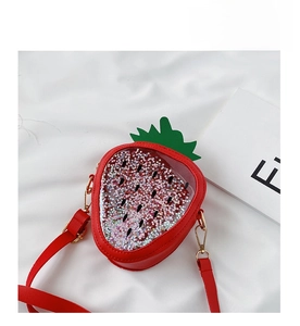 Detail of strawberry crossbody bag with liquid glitter stars inside a clear window