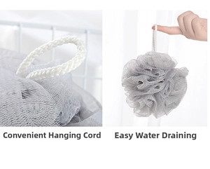 Detail of grey mesh bath sponge showing the sturdy hanging rope for easy drying