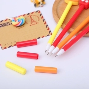 Set of creative cartoon gel pens in vibrant warm colors for office and school stationery