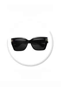 Detail of square black sunglasses featuring three gold metal stripes on the temple