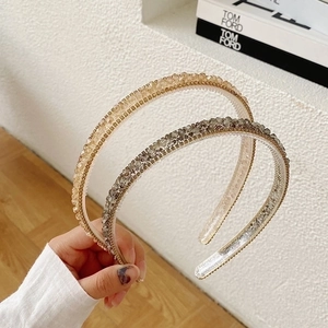 Detail of slim crystal headbands with sparkling rhinestones and non-slip inner teeth