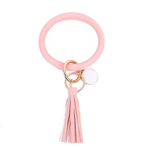 Pink PU leather wristlet keychain with elegant tassel and gold metal ring details