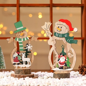 Handcrafted wooden snowman table decor with laser-cut Christmas scenes and natural wood base