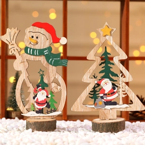 Festive wooden Christmas snowman and tree tabletop ornaments with Santa Claus scenes