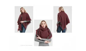 Detail of burgundy thick knit shawl with grey fringe tassels and heavy textured wool blend