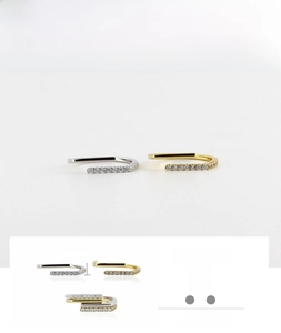 Detail showing 4.5mm irregular U-shape silver rings in gold and silver finishes