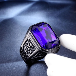 Vintage stainless steel ring featuring a large rectangular blue gemstone and Celtic patterns