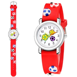 Detailed macro view of 3D embossed football patterns on a red silicone kid watch strap