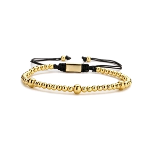 Adjustable copper beaded cross bracelet with evil eye and gold-plated zircon accents