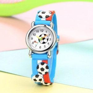 Close-up of kids' quartz watch with 3D soccer embossed blue silicone strap and colorful hands