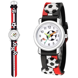 Detail of children's soccer watch showing 3D embossed strap and white football dial