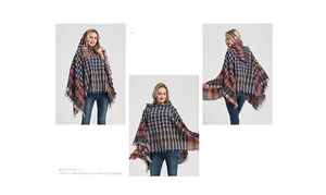 Detail view of plaid hooded poncho with soft knit texture and stylish fringe hemline