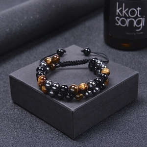 Pulsera ajustable para hombre de ojo de tigre y obsidiana en una caja de regalo