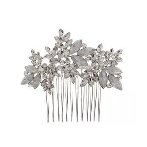 Detailed view of leaf-shaped silver hair comb with sparkling clear and smoky grey crystals