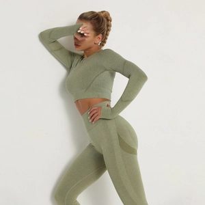 Detailed knit texture of sage green high waist seamless yoga pants and crop top set