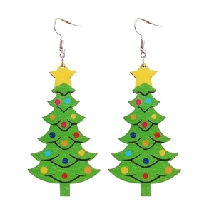 Christmas tree wooden earrings with colorful dots and yellow star on white background